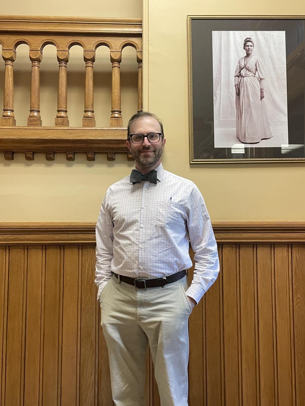 Principal Budget Analyst Daniel Liss standing in a hallway at Cambridge City Hall
