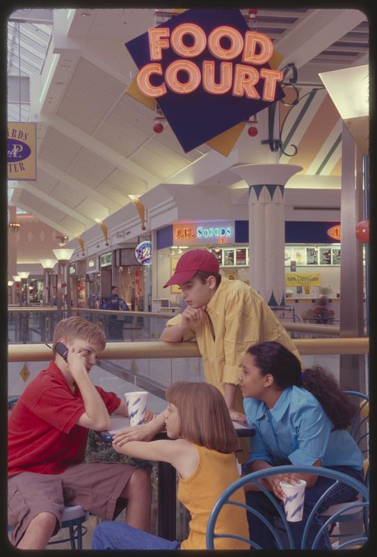 kids from 1990s in a mall