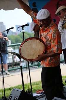 An artist performs at River Festival
