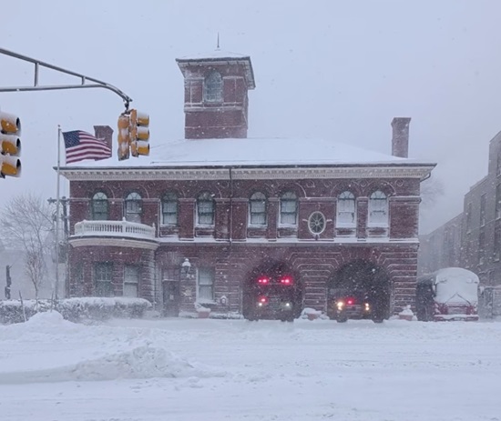 Engine 4 and Squad 4 leaving quarters at Station 4 during the blizzard of Feb 23, 2026
