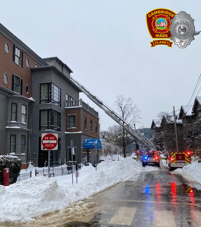 2nd alarm box 2-461 - 1137 Mass Av -  Ladder 2's aerial device deployed to the Remington St side of the fire