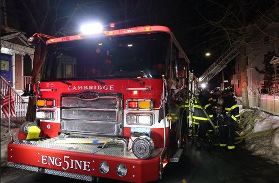 Engine 5 pump in front of the building at the working fire Box 45-413 on Inman Street