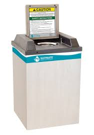 A grey swim suit dryer with its lid open.