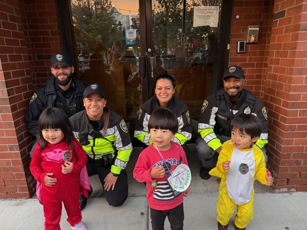 CPD Officers with Trick-Or-Treaters