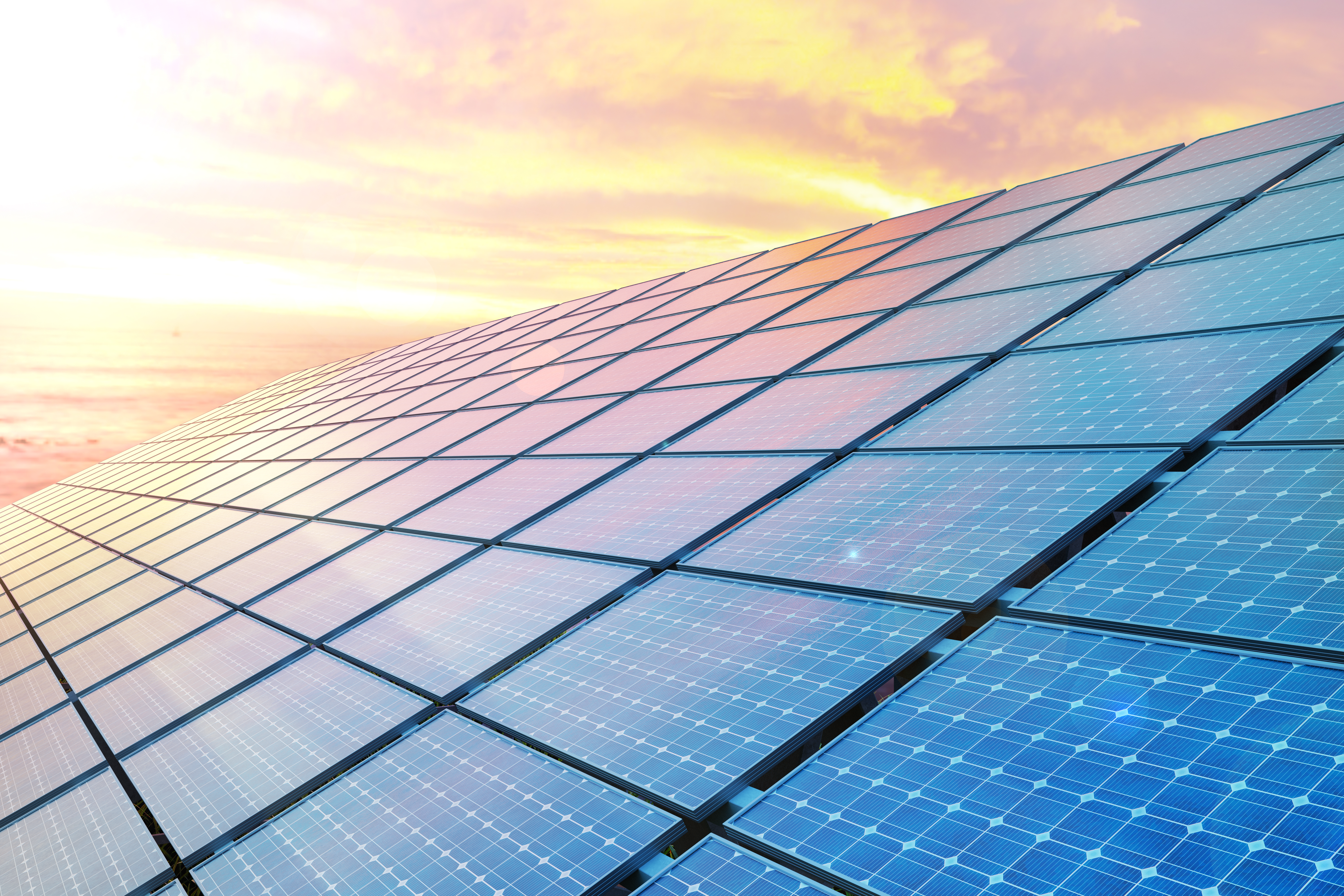A solar array at sunset