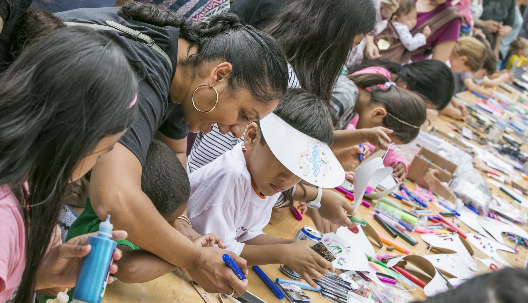 Parents and children enjoy crafts at Danehy Park Family Day