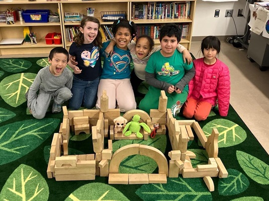 children build a structure at an afterschool program