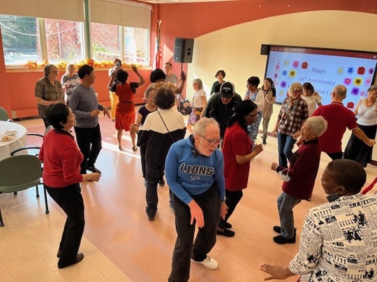 Older Adults Dancing at a Senior Center Celebration