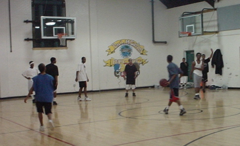 youth playing basketball