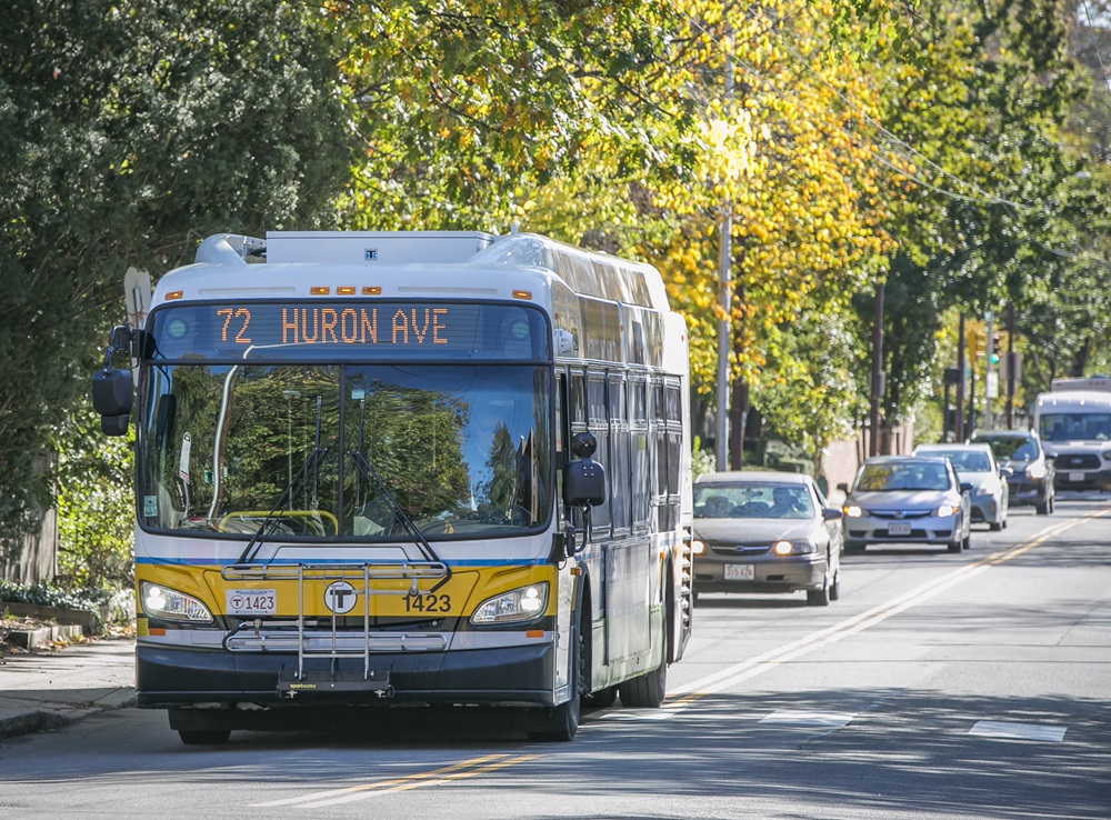 MBTA shuttle bus traveling to Huron Avenue bus stop. Reduced fares for income-eligible MBTA riders began in September 2024.