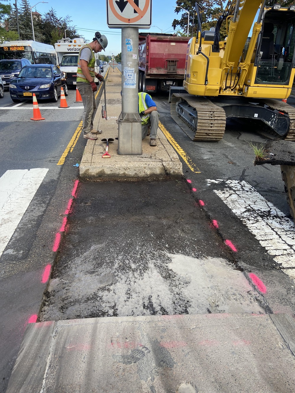 Construction is done at a crosswalk on Mass Ave and Rindge Ave, so it could be widened for pedestrians.