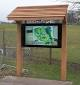 Digital sign outdoors in weatherproof enclosure