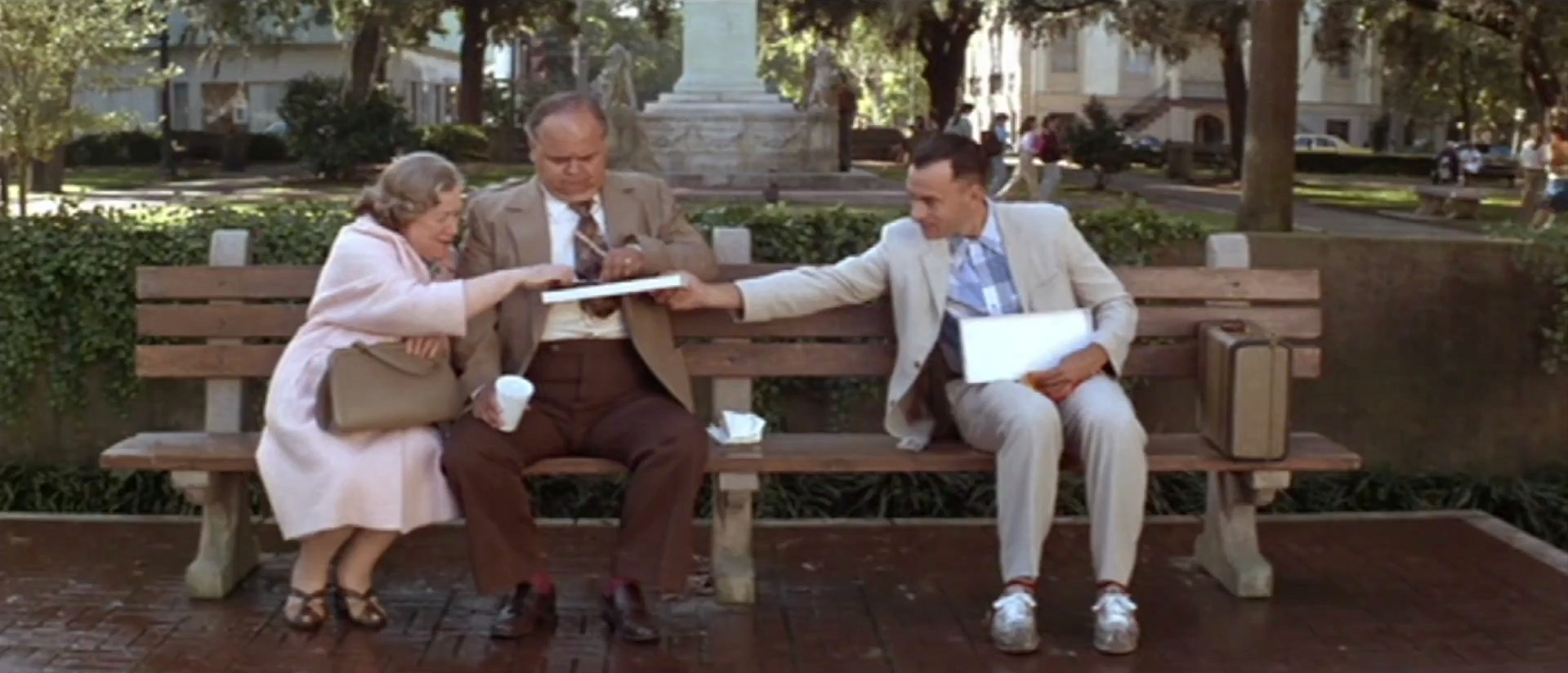 Three people on a bench together