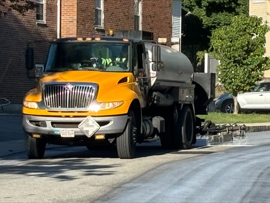 picture of truck doing fog sealing